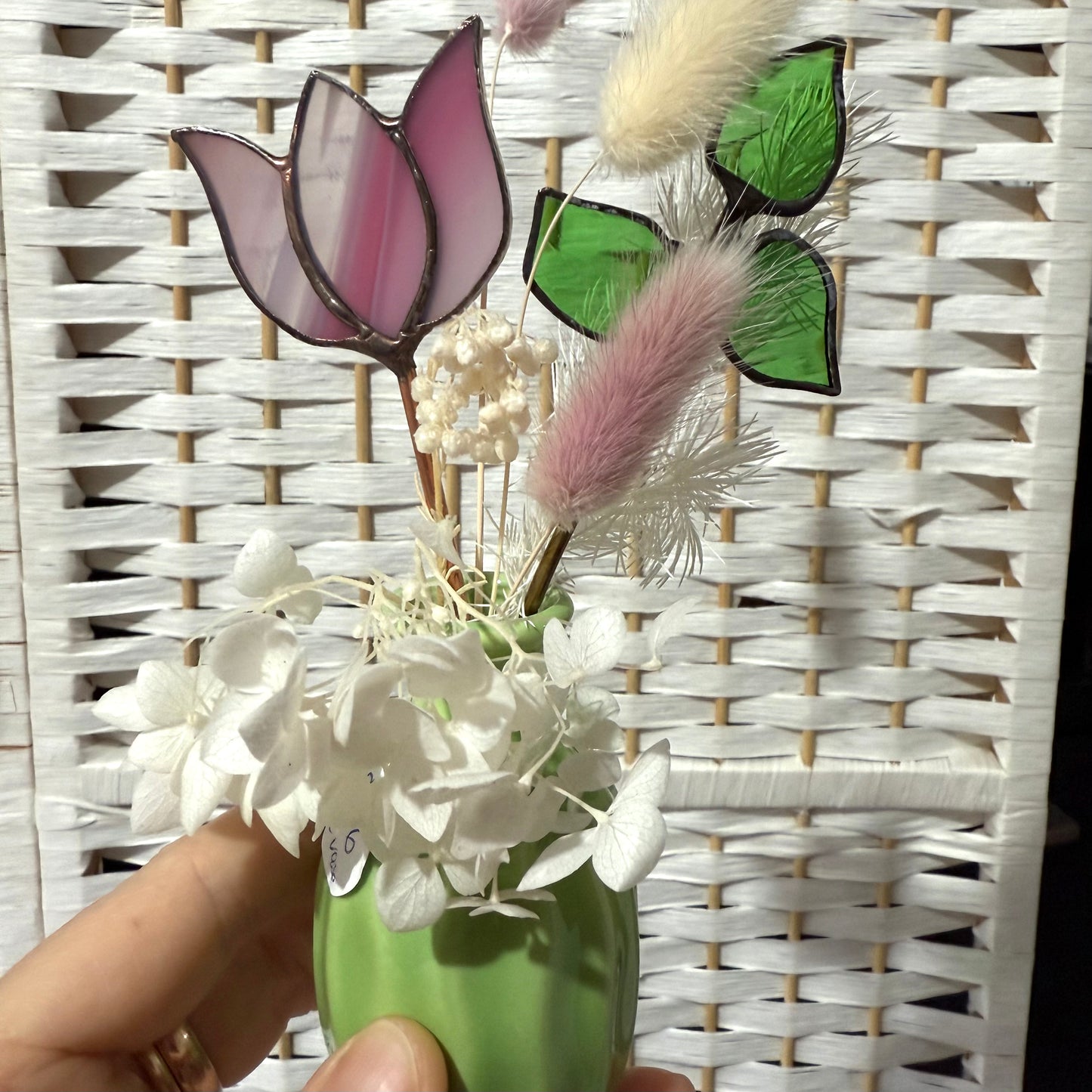 A variety of little vases with flowers