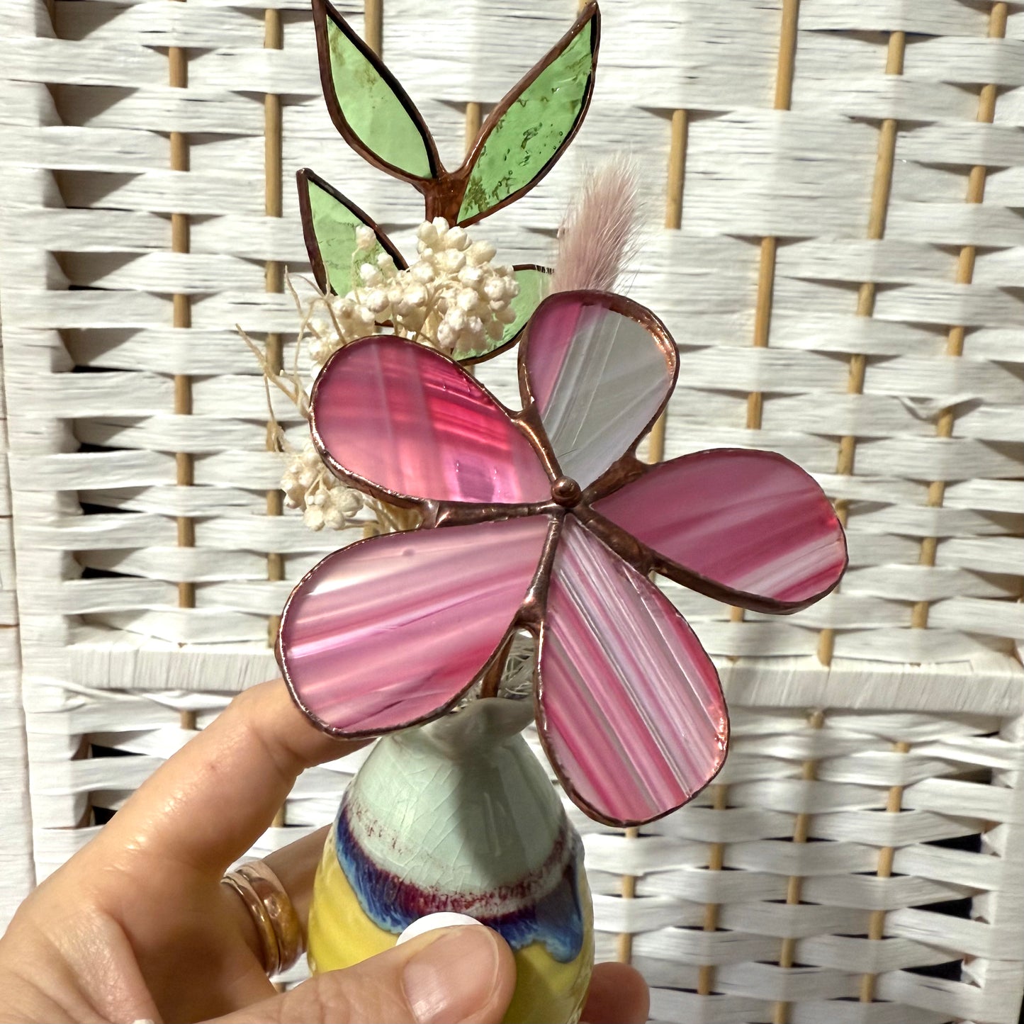 A variety of little vases with flowers