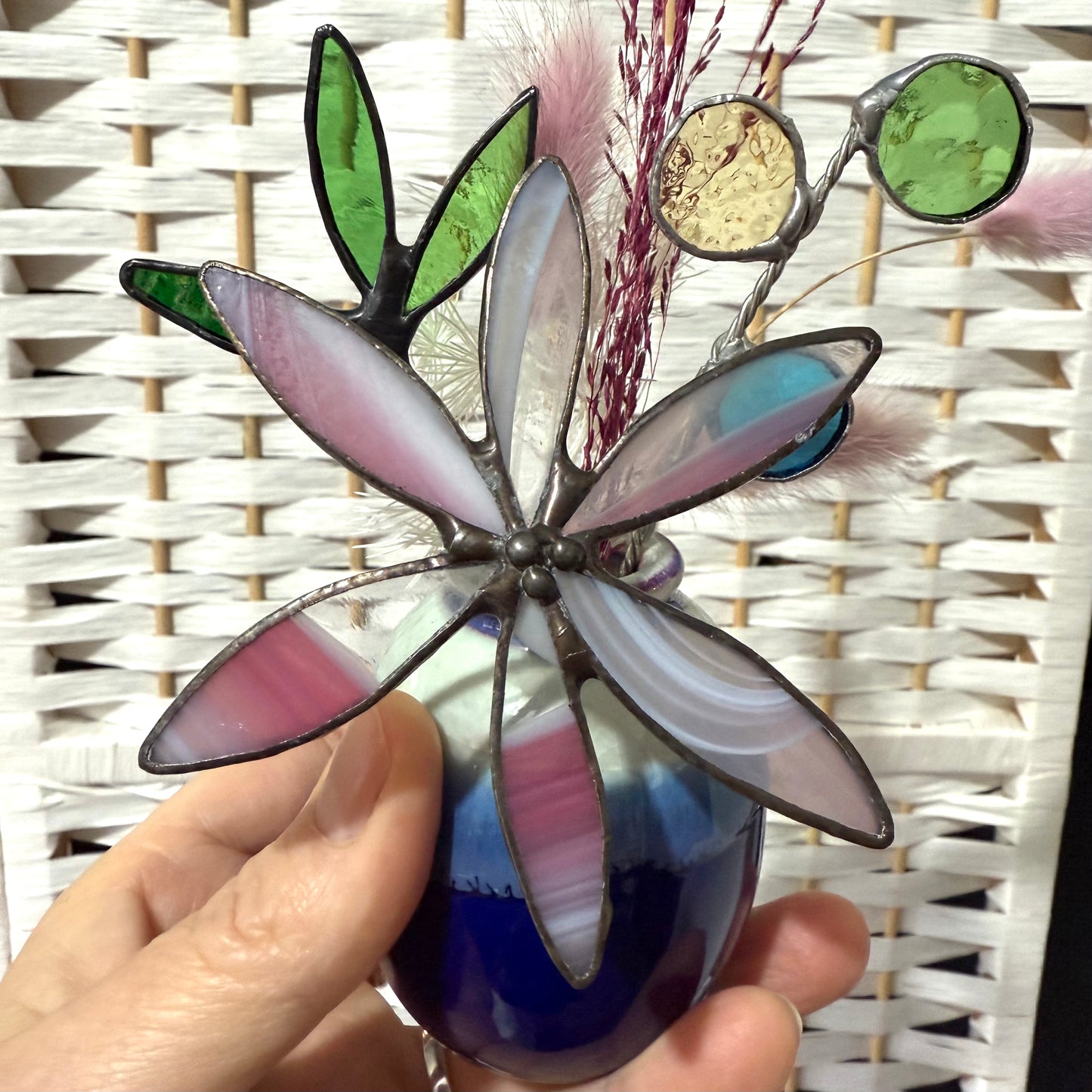 A variety of little vases with flowers
