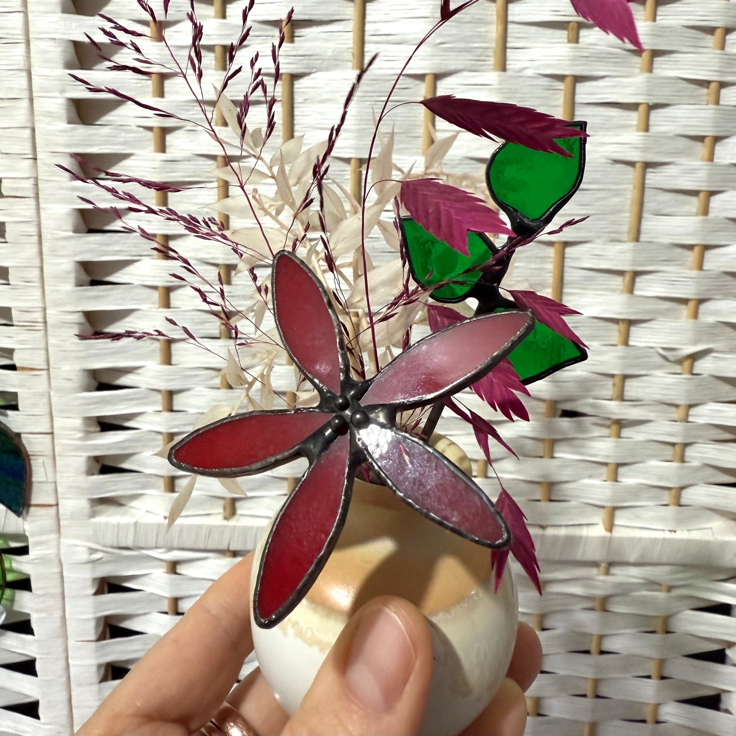 A variety of little vases with flowers