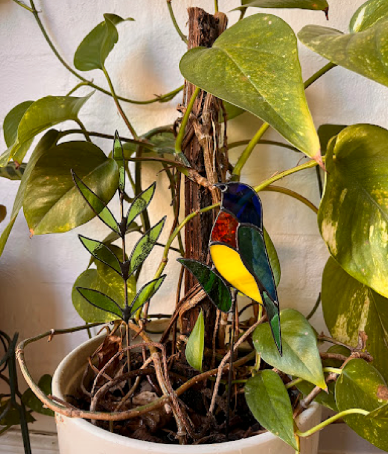Stainedglass Little Bird and leaf stem