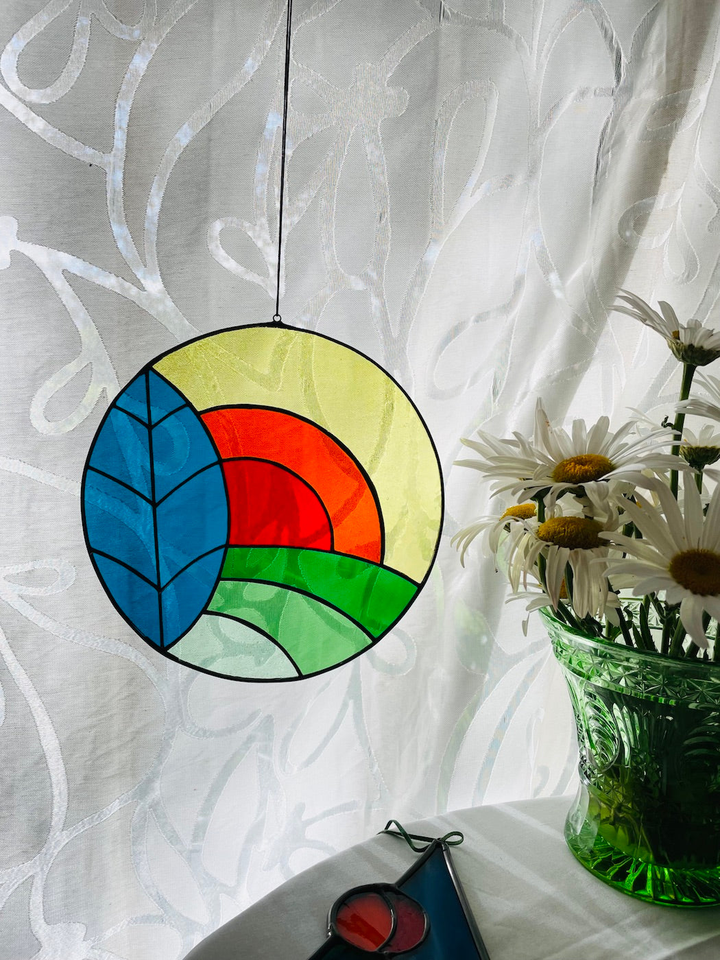 Glass Sun, Tree and hills