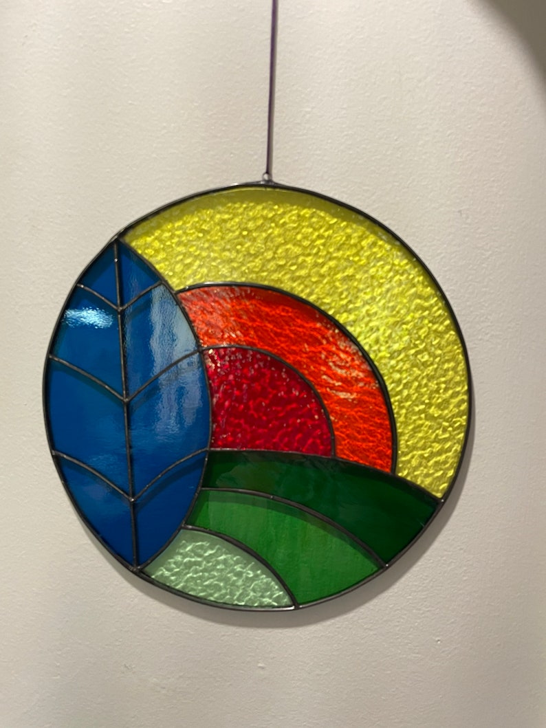 Glass Sun, Tree and hills