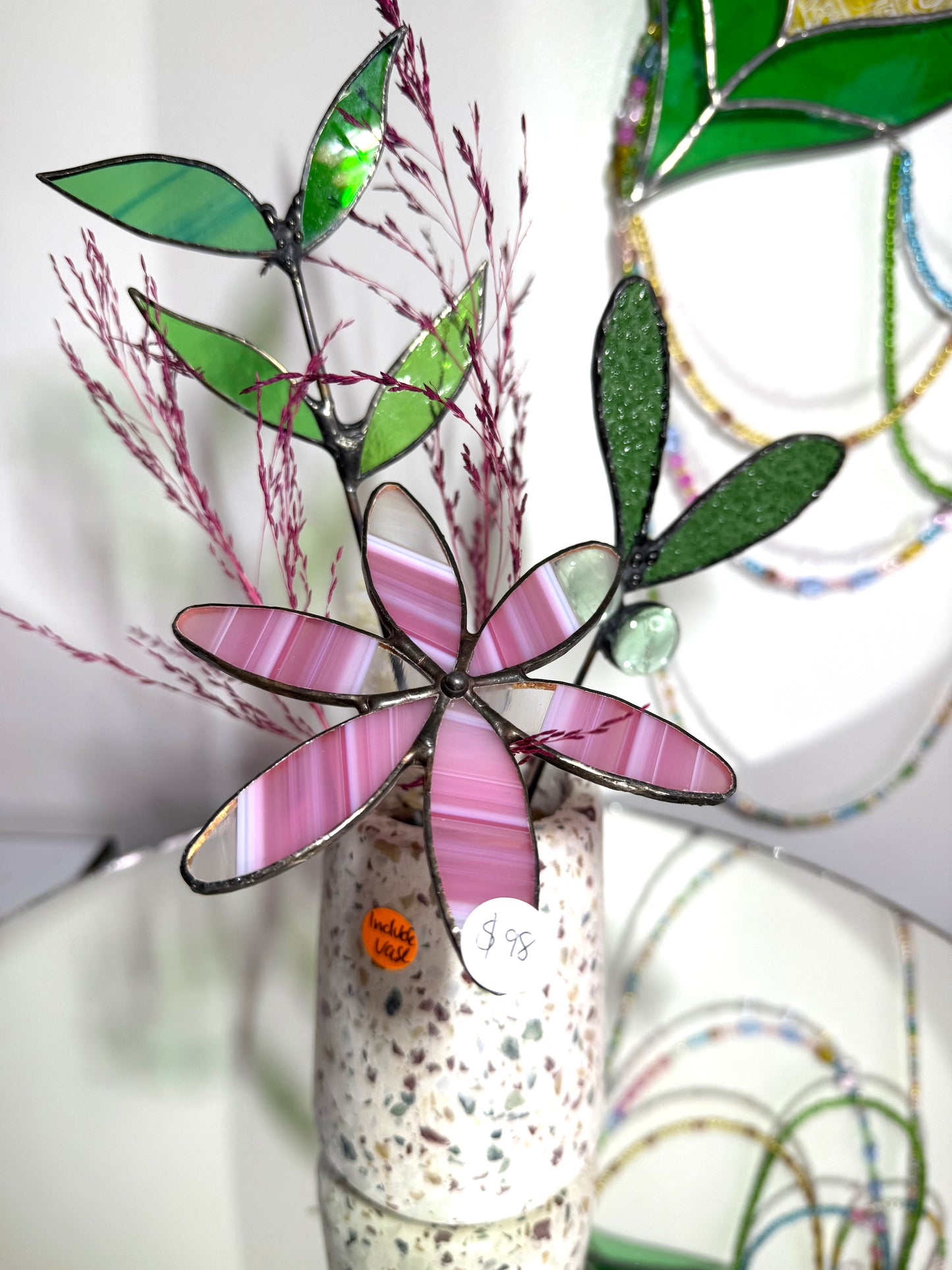 A variety of little vases with flowers