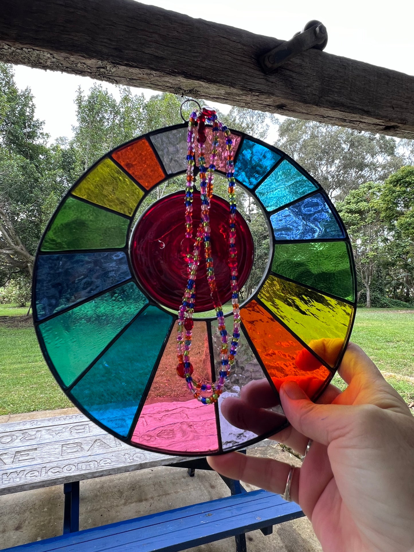 Rainbow disk with spinning centre