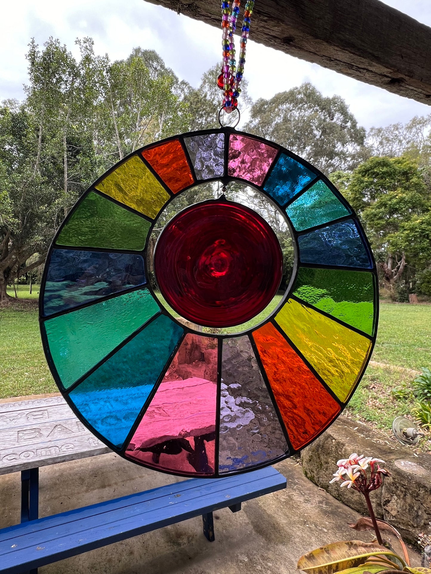 Rainbow disk with spinning centre