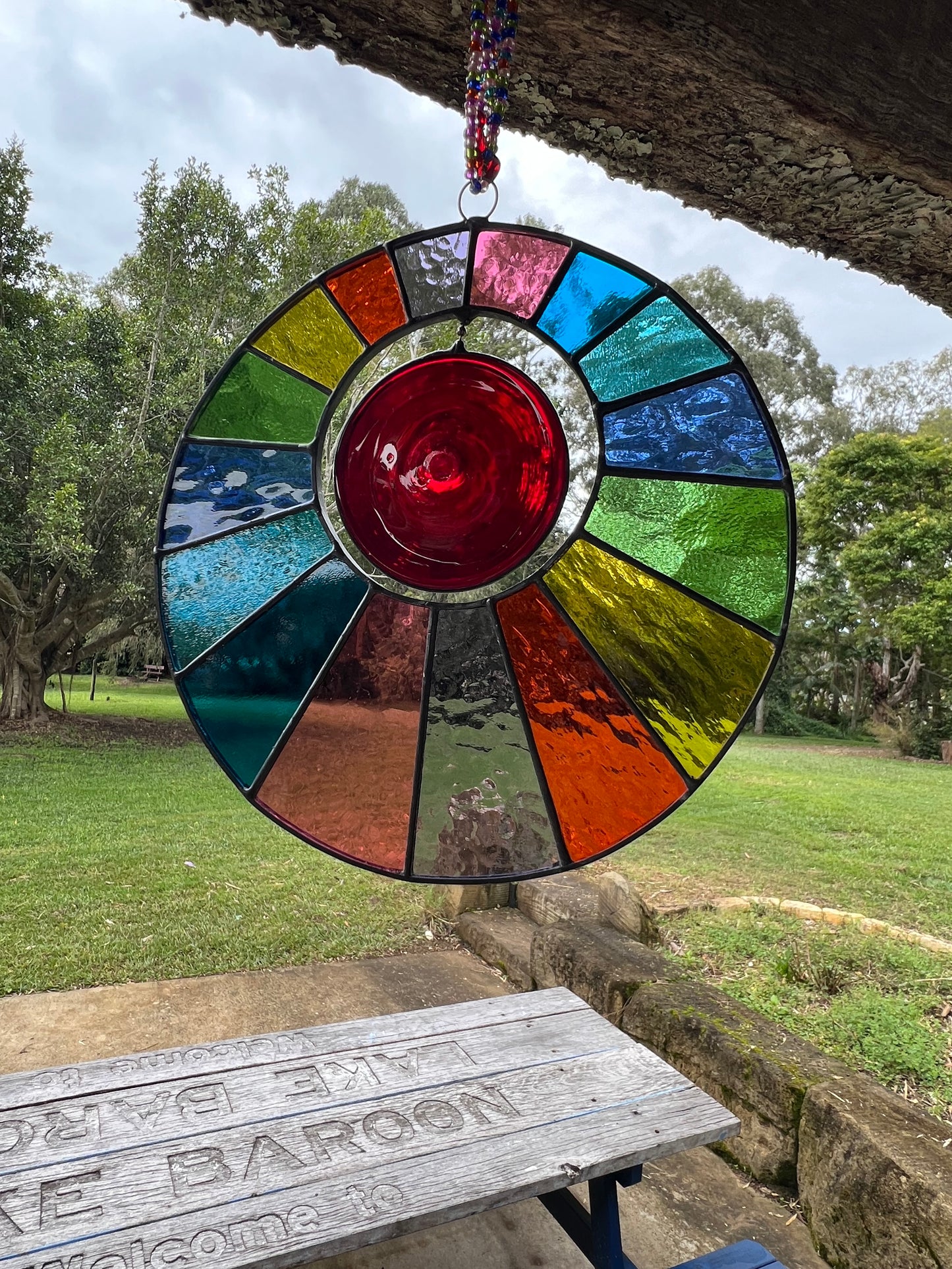 Rainbow disk with spinning centre