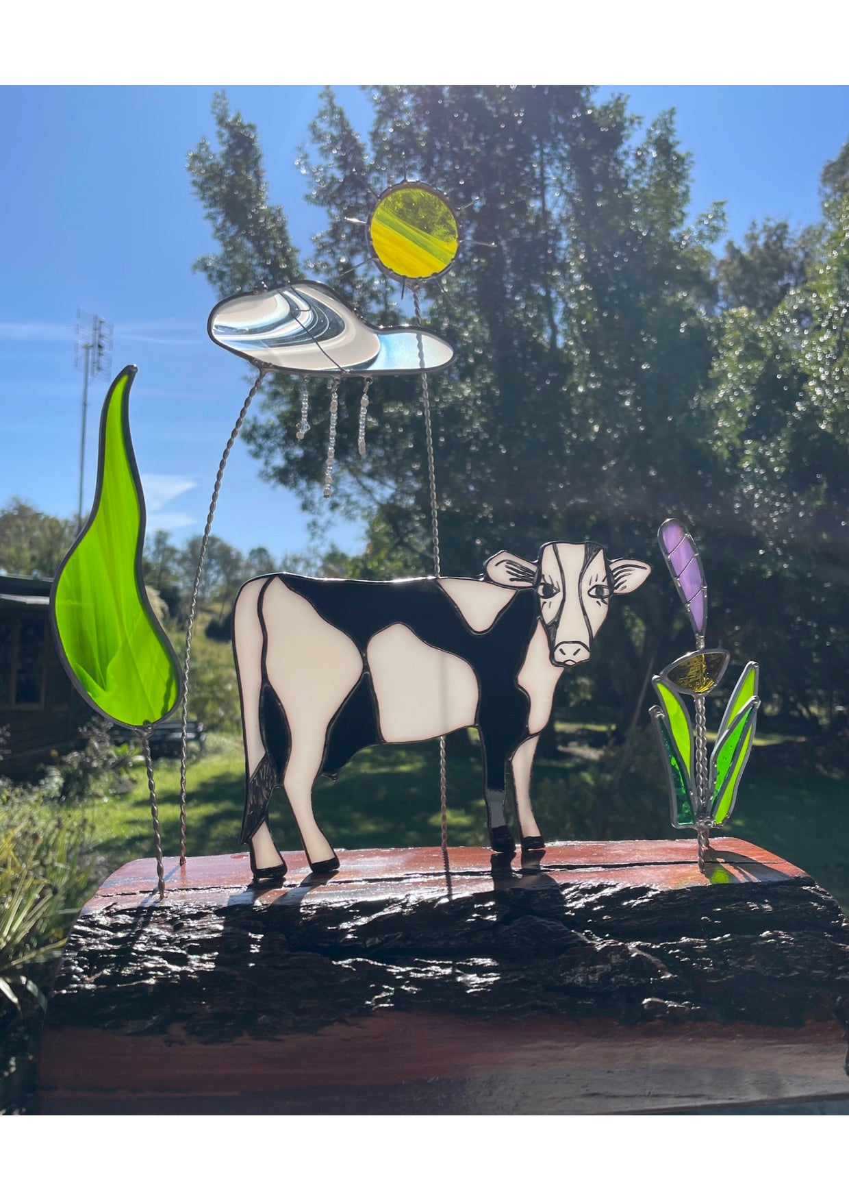 Black and White leadlight cow with flowers, sun, rainy cloud