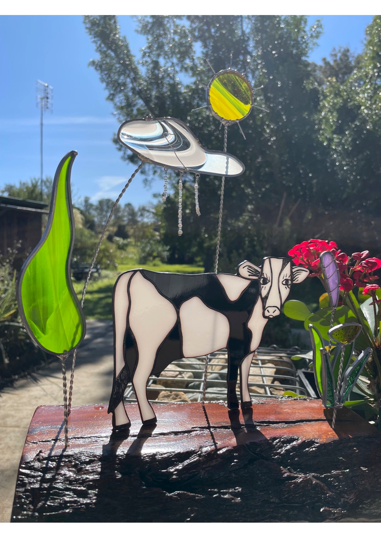 Black and White leadlight cow with flowers, sun, rainy cloud