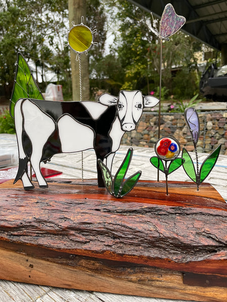 Black and White Glass Cow with Flowers and Tree and Sun