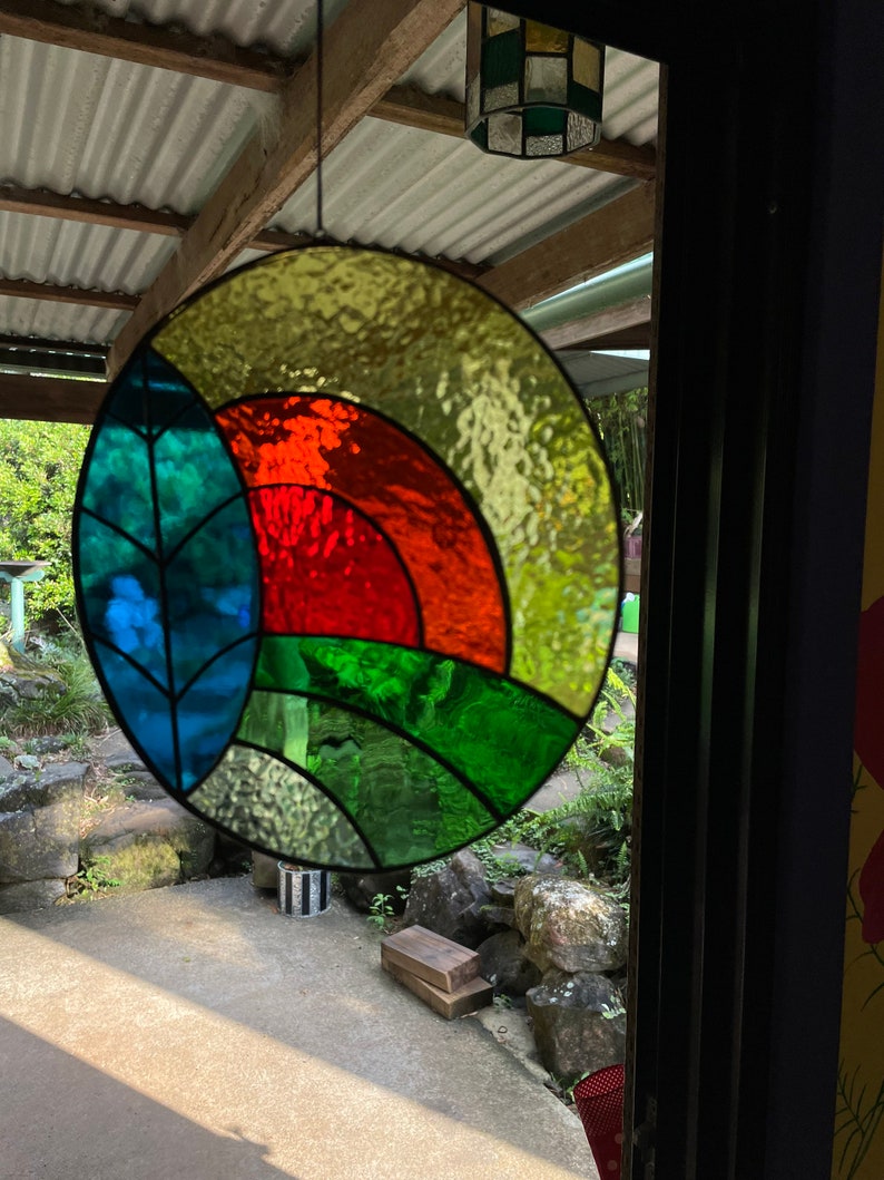 Glass Sun, Tree and hills 